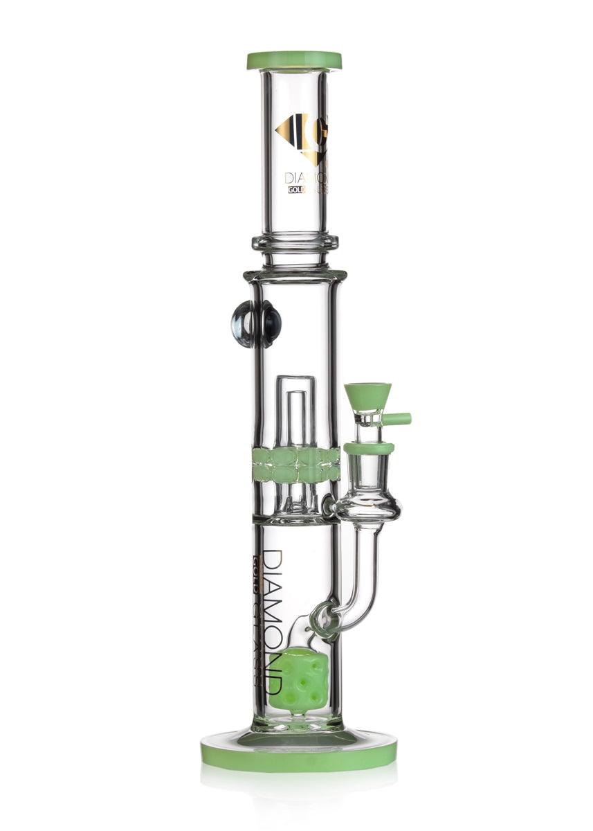 Straight Tube Bong with ratchet perc and marshmallow perc. Showcases a marble on the backside. Made by Diamond Glass company