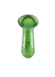 Green glass pipe on a white background