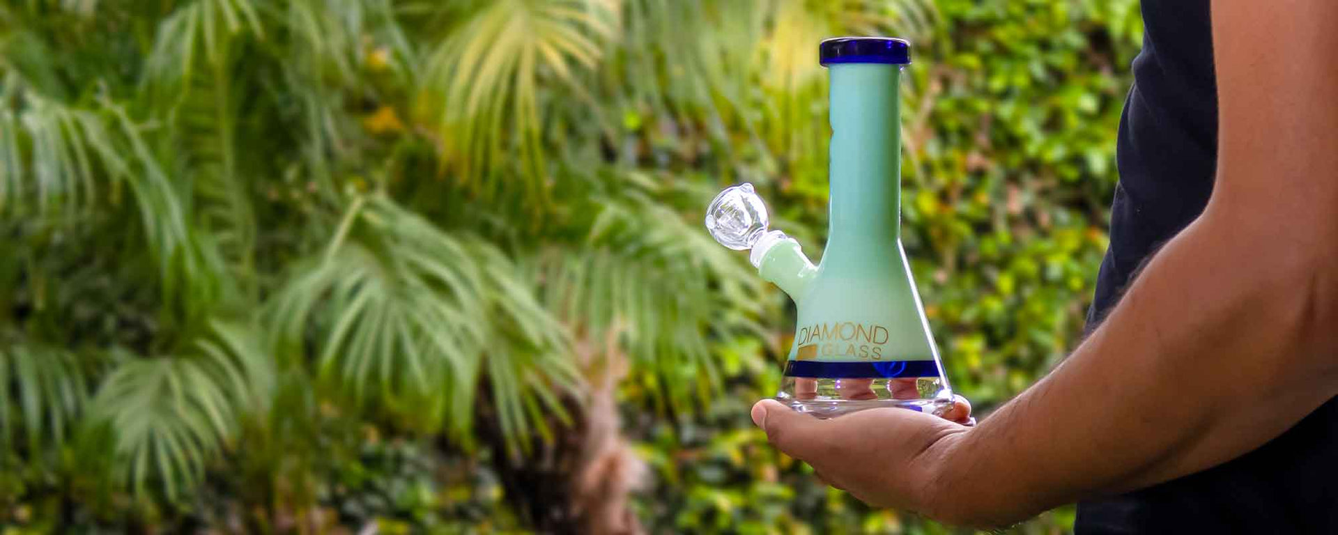 Man holding Diamond Glass Beaker Bong